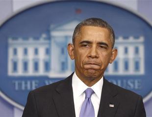 Health care debacle costs Obama dearly, poll shows