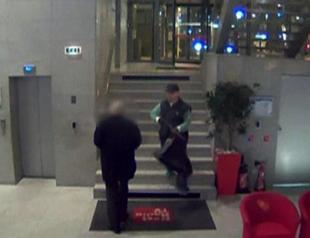 Huge hunt for Paris gunman, victim critical but better