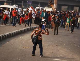 Egypt army backers, opponents scuffle on anniversary