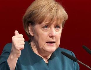 Merkel and SPD clinch coalition deal two months after vote