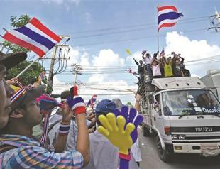 Thai protesters occupy more ministries as unrest spreads