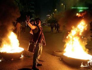 Egypt widens crackdown as two top activists ordered arrested