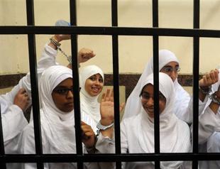 Egypt jails Brotherhood women, orders activist arrests