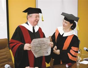 Romania gives Dr. Suver honorary degree