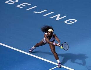 Serena stumbles through to round three in China