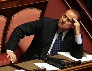 Italian PM wins confidence vote after Berlusconi U-turn