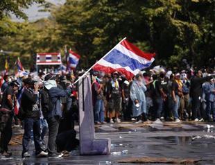 Thai PM rejects protest calls as clashes rock Bangkok