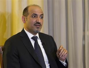 Syria opposition leader says to visit Russia