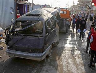 Car bomb near cafe kills 11 in central Iraq
