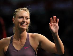 Sharapova happy with baby step return