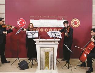 Artists protest draft law in Turkish Parliament with Mozart