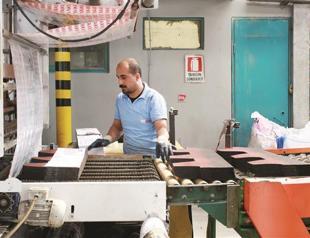 Holiday pulls down industry production