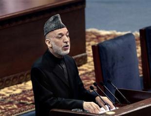 NATO warns Karzai aid at risk if no troop accord