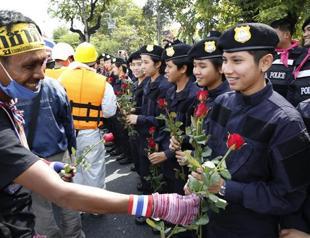Thai police yield to protesters ahead of kings birthday