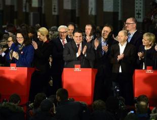 German SPD members approve grand coalition with Merkels conservatives