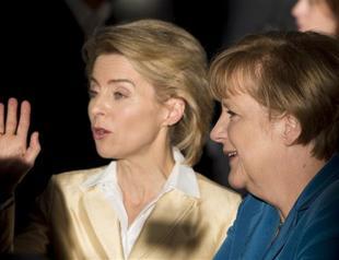 Merkel to launch government with centre-left rivals