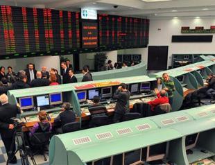 Turkish stocks, lira hit after minister urges prime minister to quit