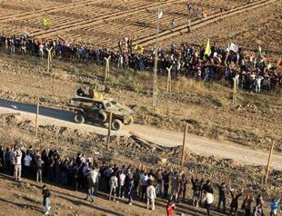 Police resort to tear gas as Kurds protest on both sides of Turkish-Syrian border