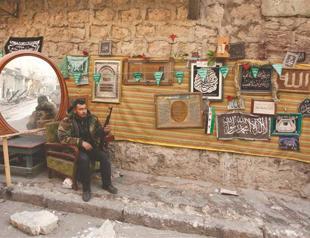 Syria rebel chief seeks united rank