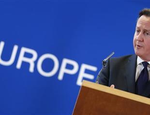 Cameron trumpets British recovery in swipe at France