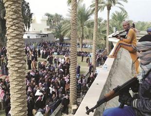 Iraq troops arrest leading Sunni MP in violent raid