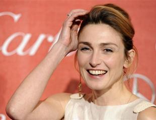 Actress linked to Hollande sues magazine over affair report