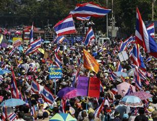 Opposition protesters march through Thai capital