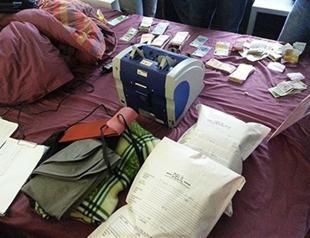 Photos of alleged bribery money seized in house of Turkish minister’s son revealed