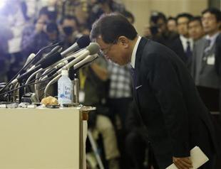 Tokyo governor who helped get Olympics resigns in money scandal