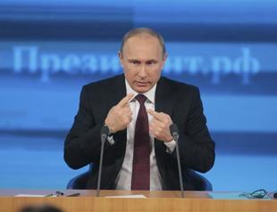 Putin says nuclear-capable missiles not yet put in Kaliningrad