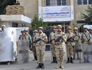 Egypt votes on new constitution as army chief eyes presidency