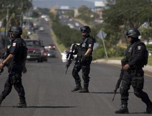 Mexico forces face off with vigilantes after clash