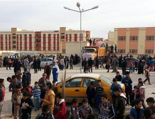 Clashes and shelling as 140,000 flee Iraq conflict