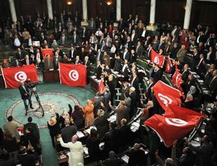 Tunisia approves new Constitution, appoints government