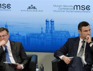 West presses Ukraine, offers treatment to injured activist