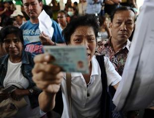 Thai protesters block voting in chaotic election