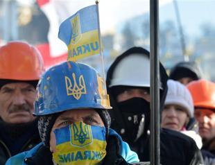 Ukraine president returns to work as protests persist