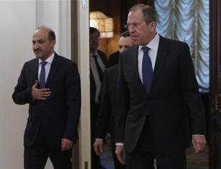 Syrian opposition chief presses Russia on al-Assad