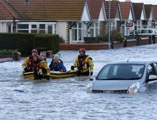 Britain evacuates thousands after storm surge
