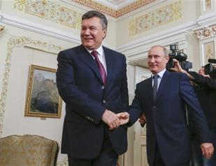 Ukraines Yanukovich heads for talks in Russia with Putin: news agency