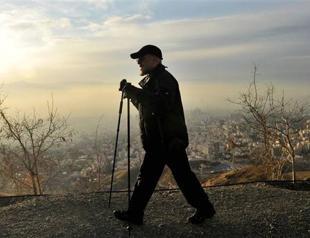 Iranian President Rouhani seen on casual hike in the hills