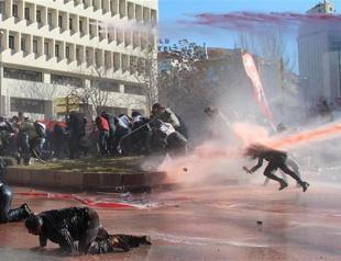 Scenes showing Turkish reporter falling due to water cannon raises eyebrows