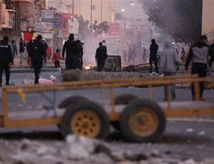Bahrain protesters clash with police on uprising anniversary