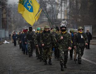 Protesters evacuate Kiev city hall in symbolic concession