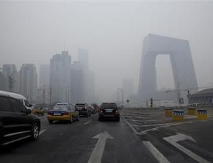 Beijing issues rare air pollution alert