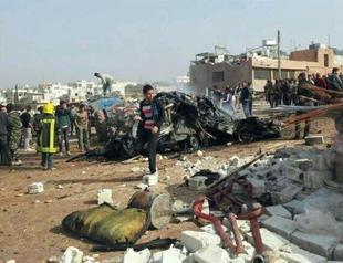 Car bomb kills 14 in Syrian town on Turkish border: Activists