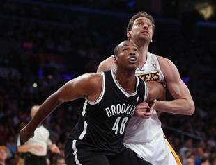 Collins takes court as first openly gay NBA player