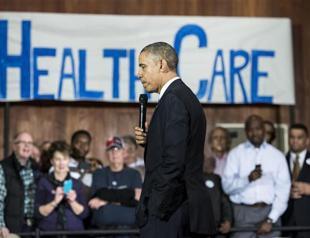 Obama apologizes for healthcare insurance pledge, website