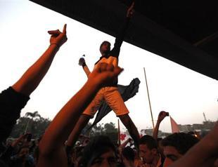 Clashes between Morsi backers and opponents in Cairo kill two, including one child