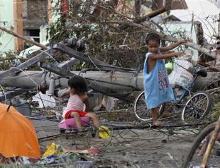 Over 1,200 feared dead in typhoon-devastated Philippines